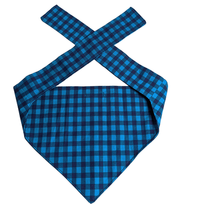 Dog with Blue Tartan Bandana - A trendy pet bandana that adds a touch of sophistication to your furry friend's appearance.