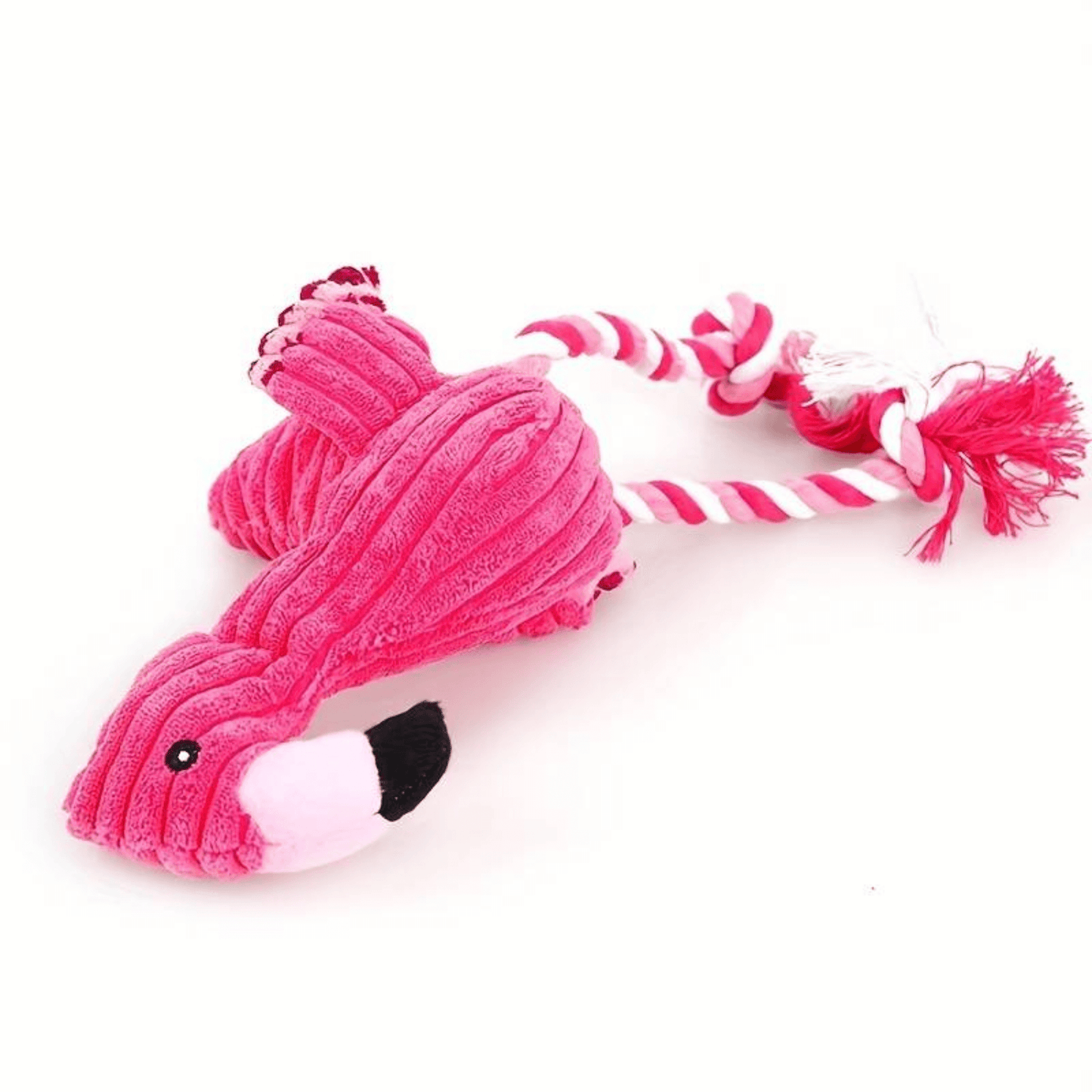 A side view of a pink flamingo dog toy. The toy has a long neck and legs, and it is made of soft, plush material. The toy has a squeaker inside that will make a noise when your dog chews on it. The toy is perfect for both large and small dogs, and it is sure to keep your furry friend entertained.